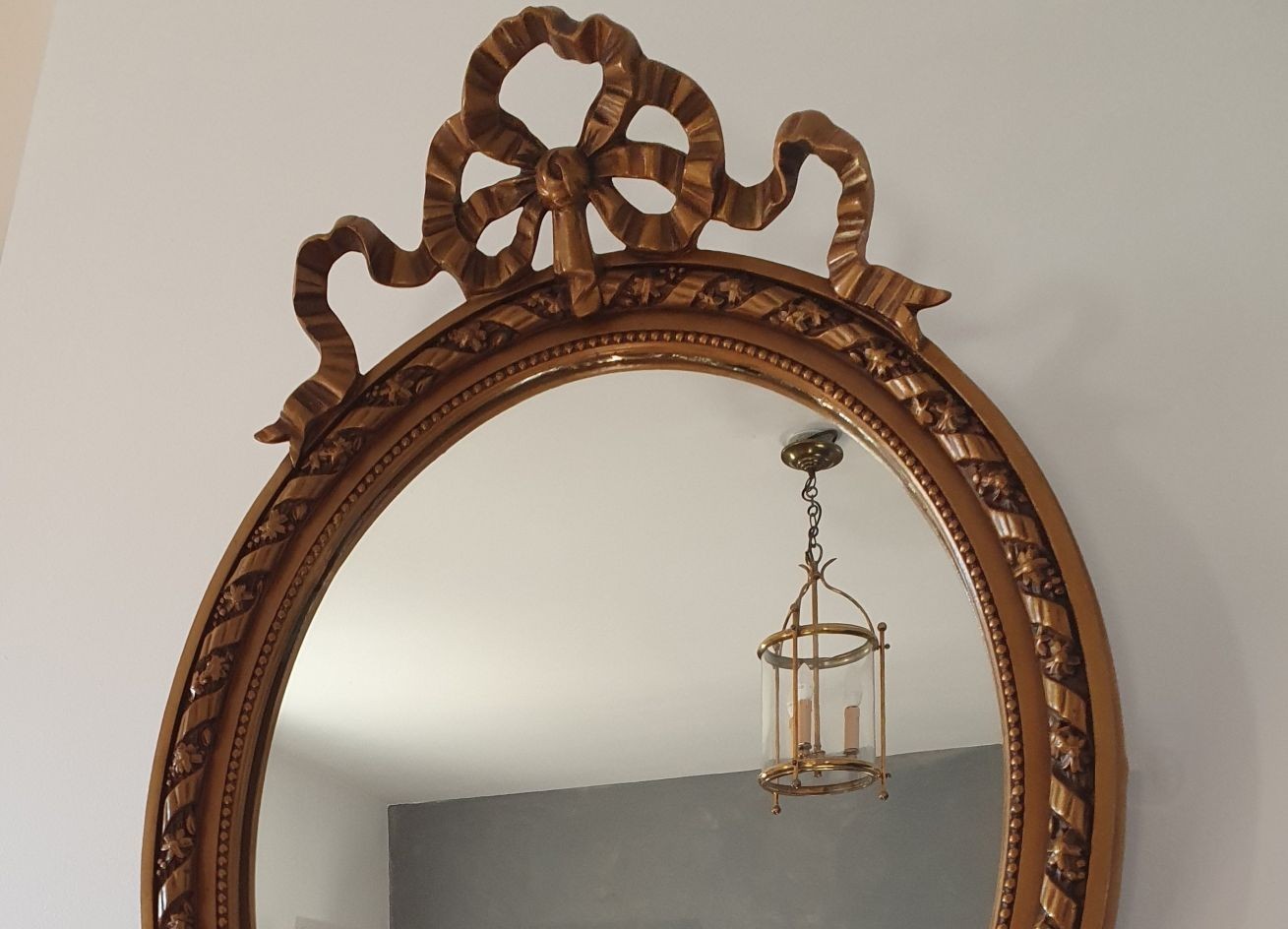 Miroir ovale style Louis XVI restauré