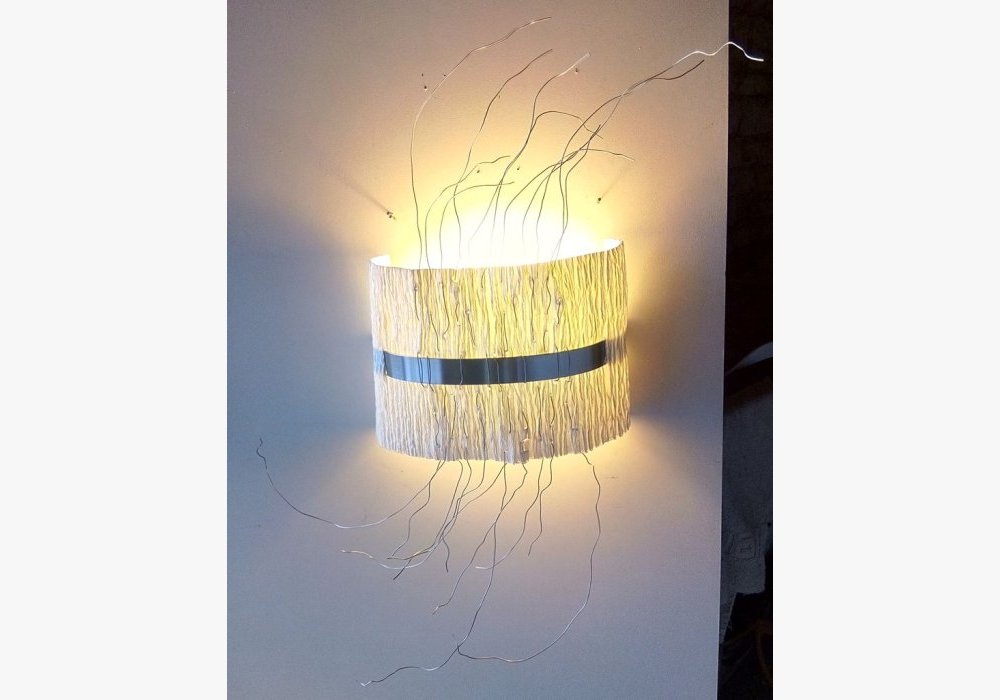 applique en inox et papier artisanal
