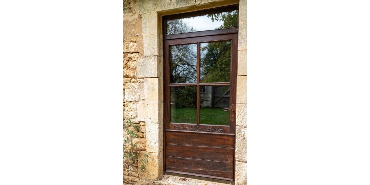 Porte d’entrée chêne sculptée