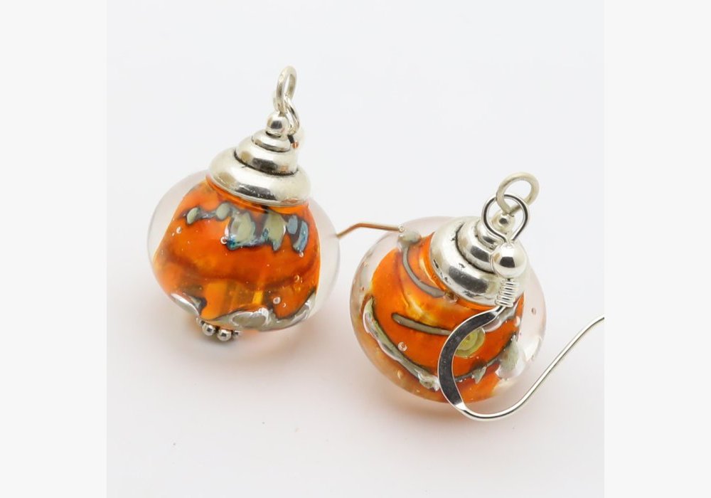 boucles à l’argent